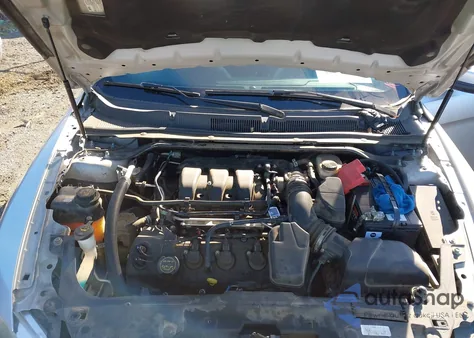 2015 Ford Taurus Sel z USA, uszkodzony, nr VIN 1FAHP2E80FG127085